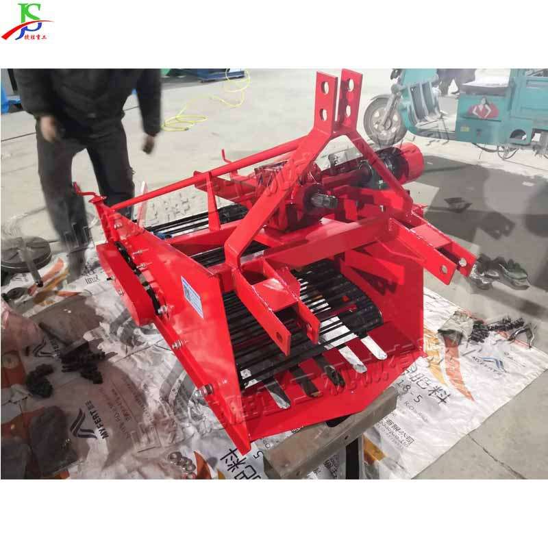 拖拉机牵引式农田捡石头设备 土壤筛石自动装车机 田间管理捡石机
