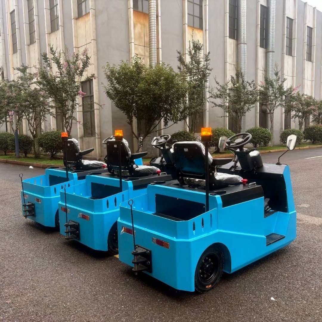 厂区蓄电池牵引车头物流车间电动牵引车四轮平板物料搬运车挂车