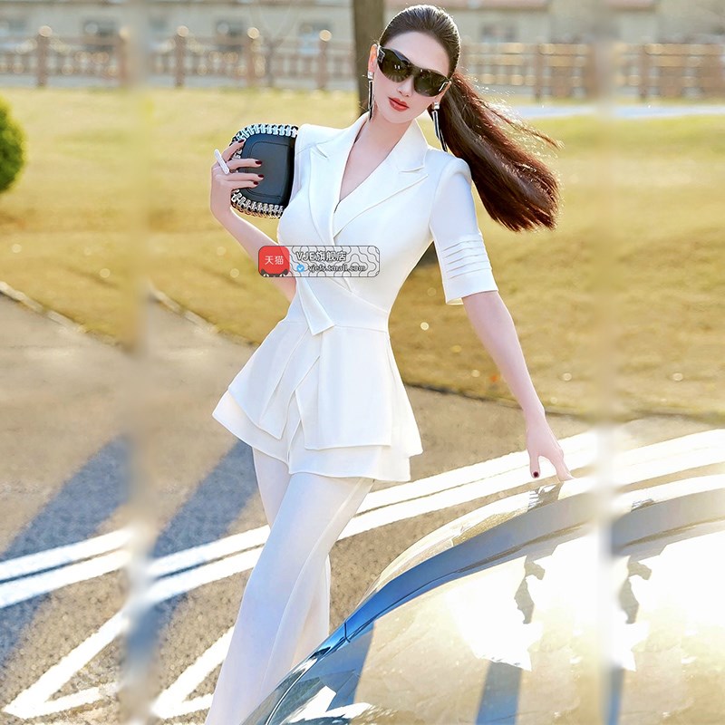 夏日时尚不规则设计感上衣喇叭裤两件套2025新款小众短袖薄款套装