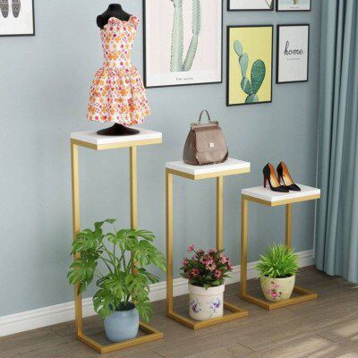 服装店中岛陈列鞋包简约流水台柜展示橱窗高低落地置物货架子花