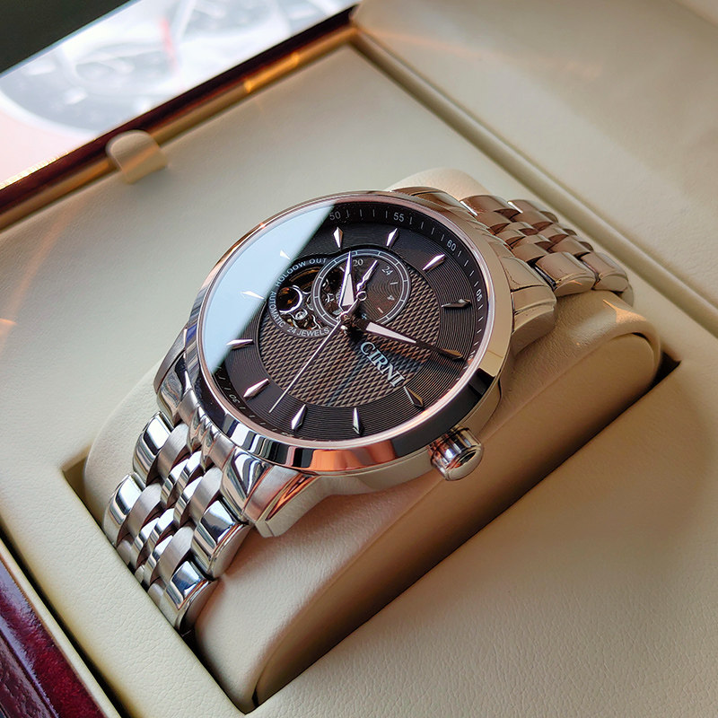 西亚尼手表男士全自动机械表十大正品牌瑞商务精钢带防水镂空男表