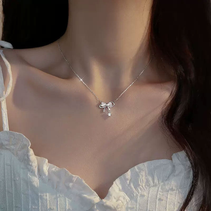 S925纯银蝴蝶结项链女款轻奢小众锁骨链猫眼石颈链新款