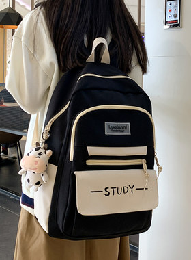 书包小学生三到六年级大容量女2023新款初中生女生黑色帆布双肩包