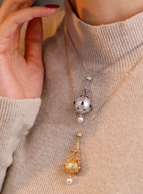 金色珍珠吊坠网兜项链秋冬女士高颜值小众设计气质毛衣链女高级感