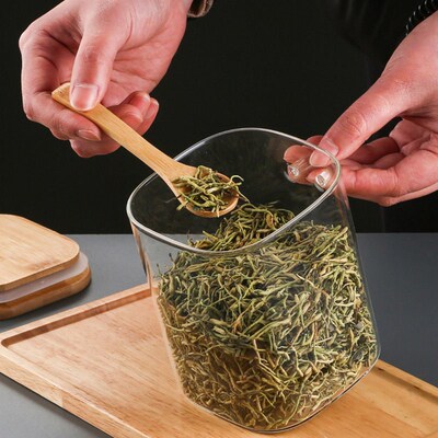 Glass sealed container with a spoon - kitchen storage contai