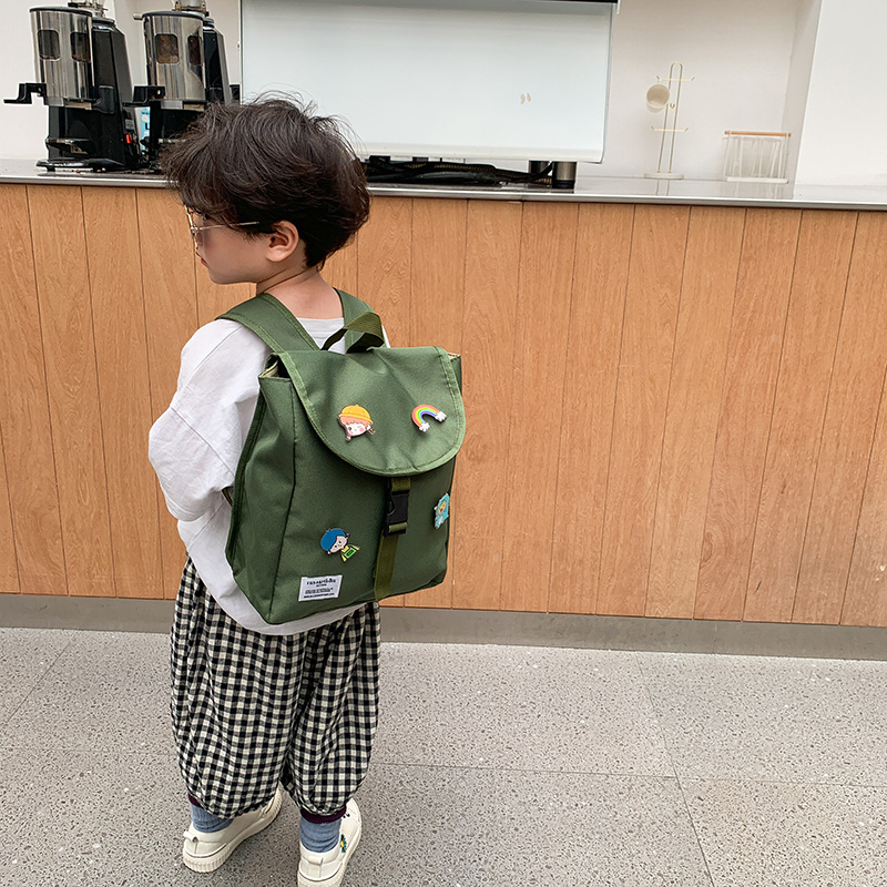 韩版儿童帆布男孩时尚百搭徽章幼儿园书包小童宝宝迷你背包