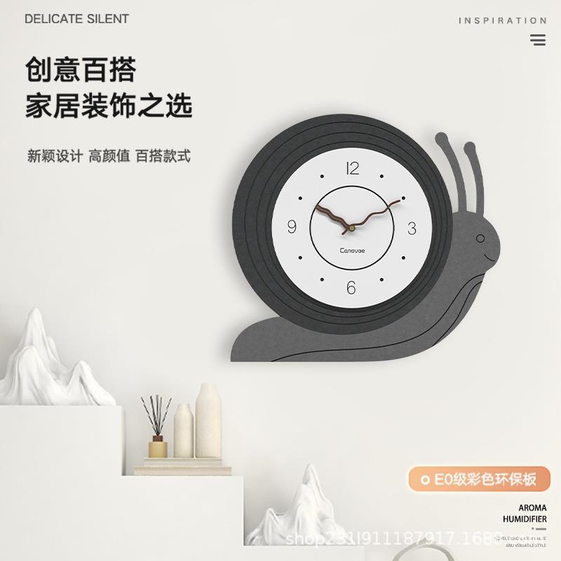 现代简约挂钟客厅时尚家用装饰时钟挂墙艺术餐厅网红蜗牛创意钟表