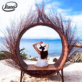 巴厘岛悬挂吊椅民宿创意网红藤编鸟巢圆躺床秋千景区婚纱拍摄道具