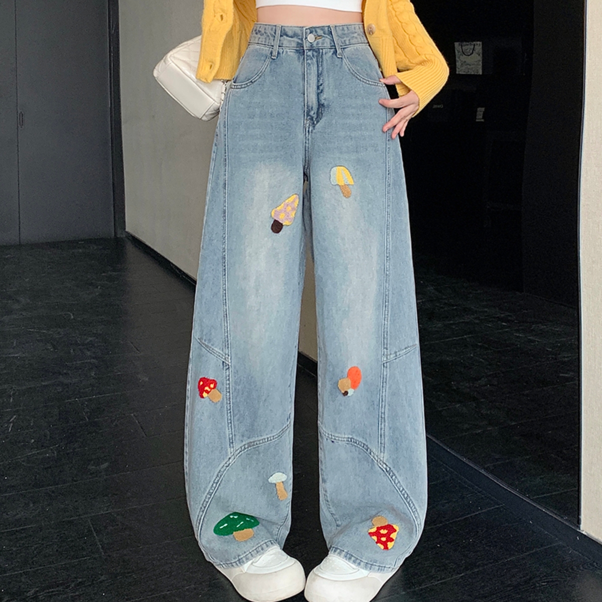 实价实拍2025秋装新款胖mm大码女时尚卡通刺绣设计感牛仔弯刀裤