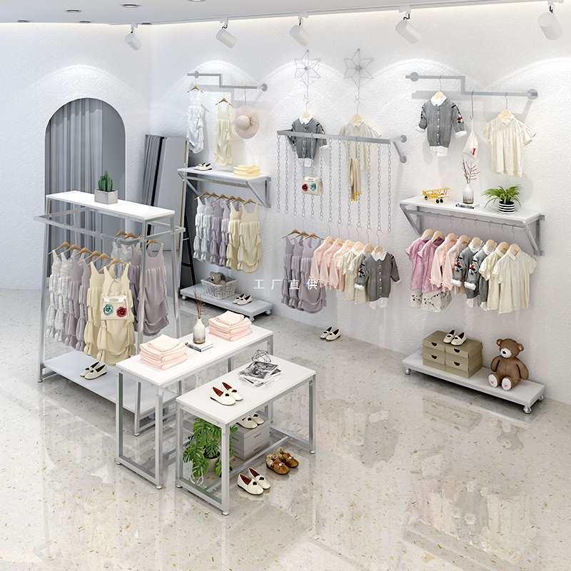 童装店装修效果图网红小型服装店铺上墙落地式中岛流水台组合货架