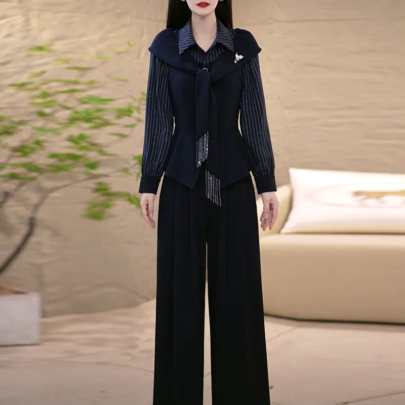 广州十三行爆款套装女秋季2026新款显瘦条纹拼接上衣阔腿裤两件套