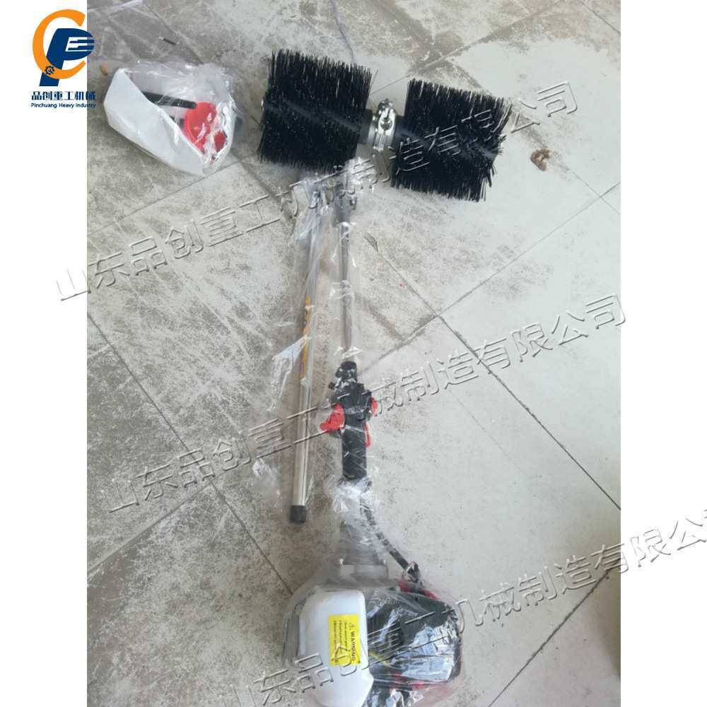 手推式梳草清理机 小型便携式手提刷草机 汽油动力人造草坪清理机