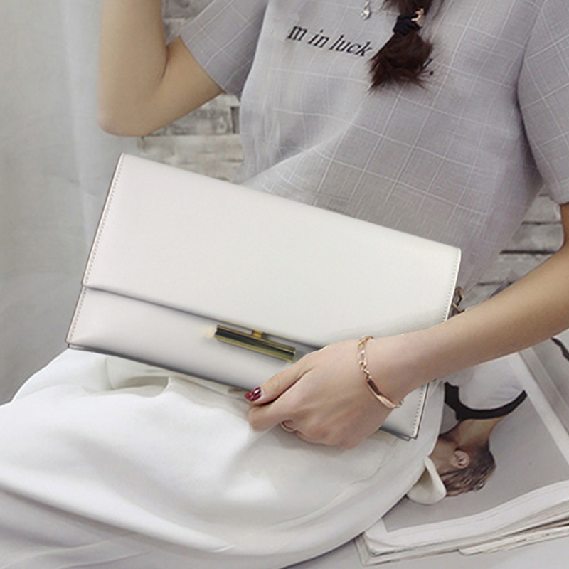 女士真皮手拿包女包2021新款夏季白色时尚气质手包小众斜挎小包包