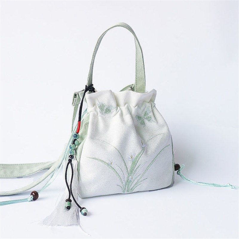 复古斜挎包古风包包文艺配汉服旗袍刺绣流吊坠手机袋束口单肩背包,玩具/童车/益智/积木/模型,斜挎包/拎包/腰包,淘宝优惠券,粉丝福利购,淘宝优惠卷