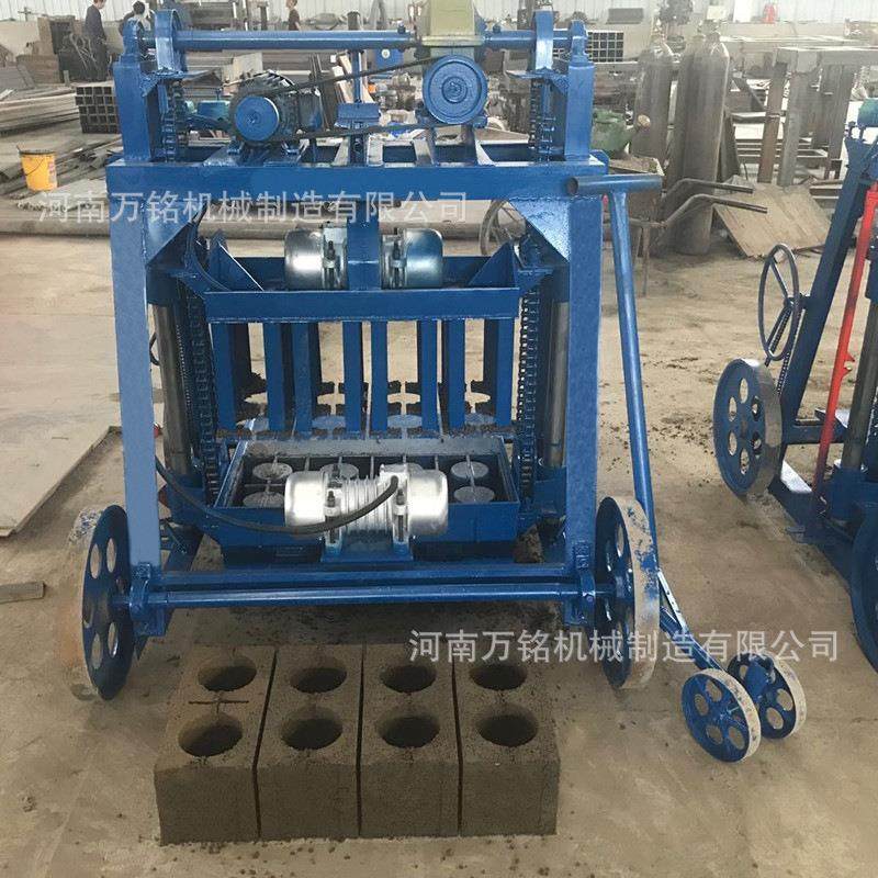 云南德宏4-45免托板移动式390x190x190圆孔空心砌块机水泥制砖机