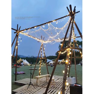 户外营地露营团建篝火派对氛围草地木头树干门头设计定制拱门支架