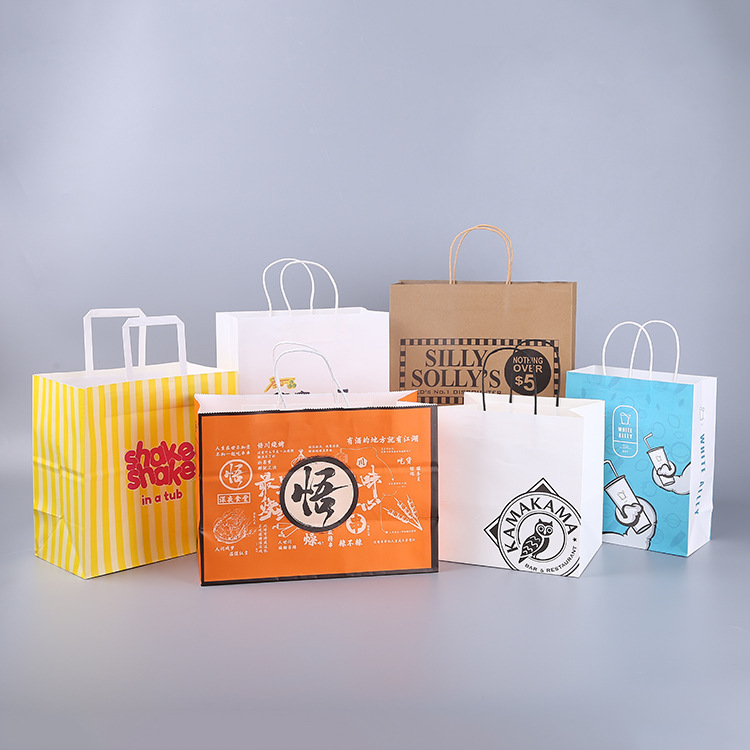 厂家供应购物牛皮纸袋 手提服装袋包装袋 礼品纸袋可印圣诞logo