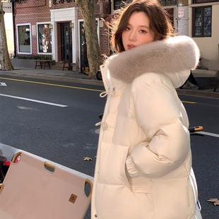白鸭绒粉色高级感羽绒服女中长款冬季2025新款a字版宽松轻薄保暖