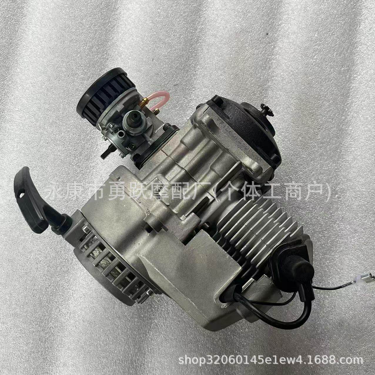 你摩迷托车件发动机49CC小跑车小四配两冲程汽油40-6发动发轮动机