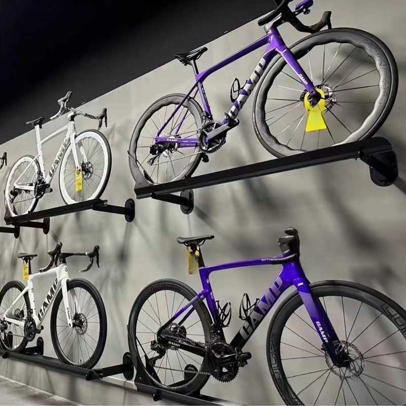 新款山地自行车墙体壁挂式展示架车店公路车上墙货架室内停车架