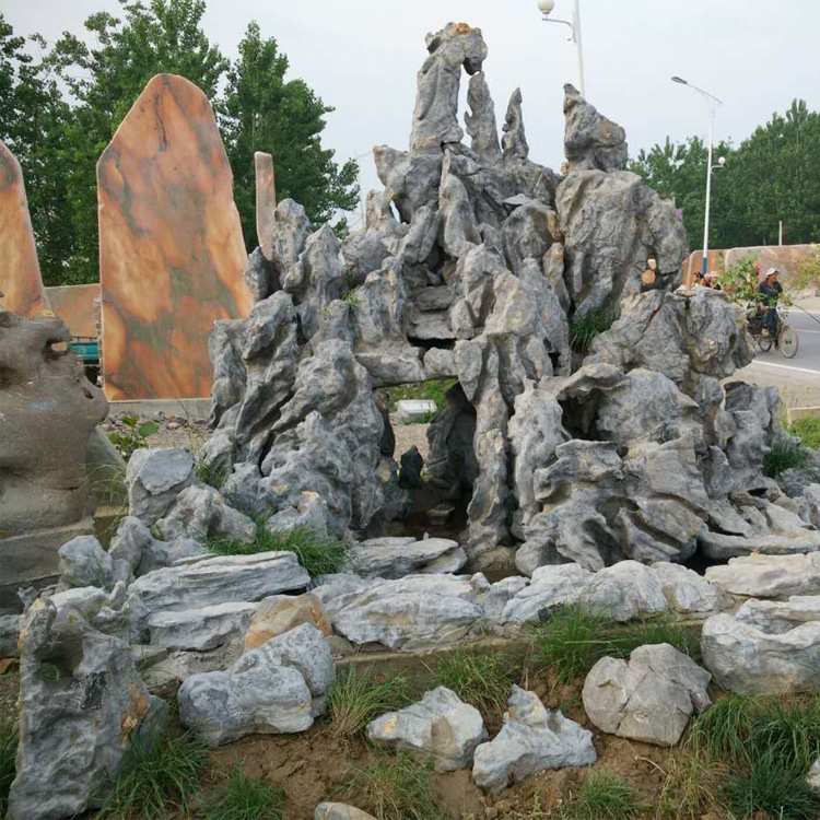供应天然灵璧石园林假山景观施工设计大中小型石头石材景观设计