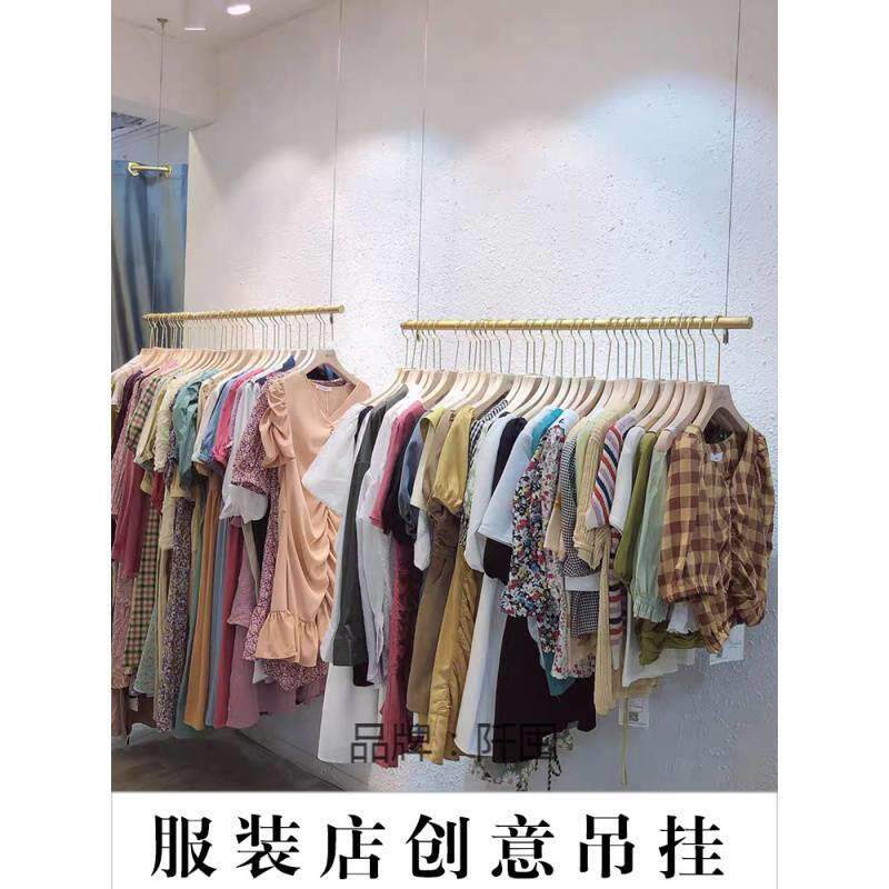 服装店挂衣架壁挂墙上钢丝绳吊挂不锈钢展示架女装橱窗简约悬挂架