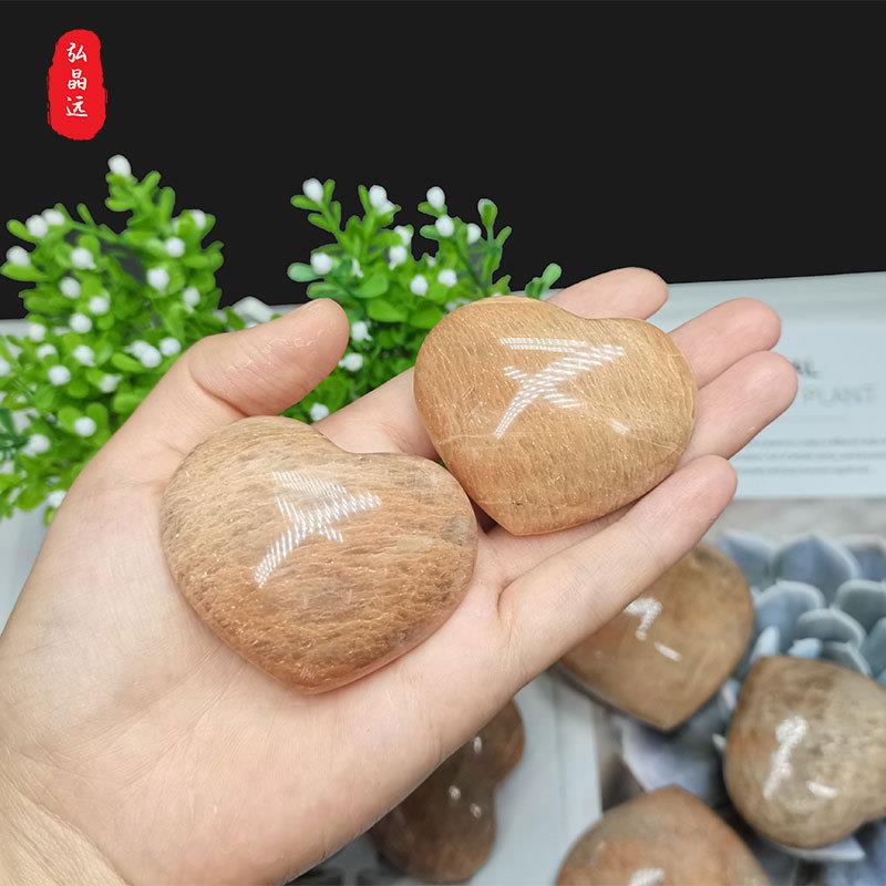 天然橙月光爱心把玩黄月光石心形手把件健身把玩原石打磨