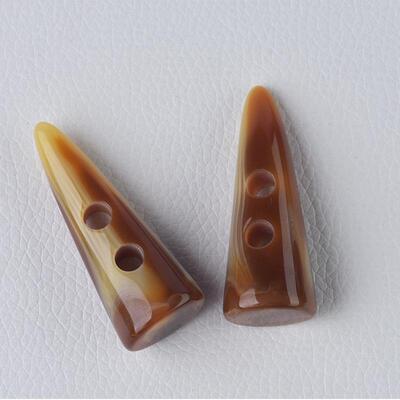 脂仿牛角形纽扣厂家女士风树呢大衣纽扣货HPE辅料现花衣纹扣子