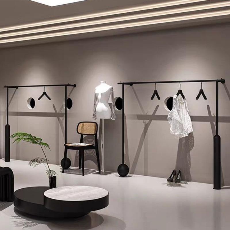 网红男女墙上服装店展示架陈列架黑色装铁艺上墙挂衣架壁挂式货架