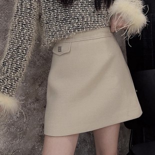 羊毛呢半身裙女2024秋冬款高腰显瘦黑色高级感气质小个子a字短裙