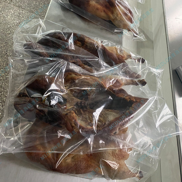 厂家直供烤鸡包装机械烤鸡枕式包装机器酱货烧鸡包装机械设备