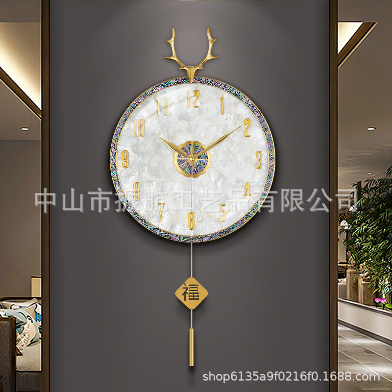 2024新款家用钟表客厅挂钟简约现代网红创意轻奢贝壳挂表挂墙