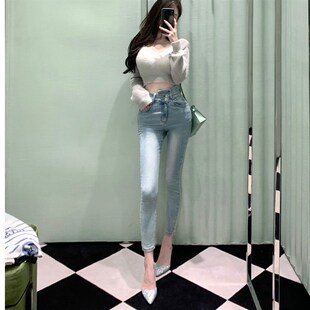 剪裁腰细胯宽蓝色高腰紧身牛仔裤 性感斜扣小脚韩国东大门时牛仔裤