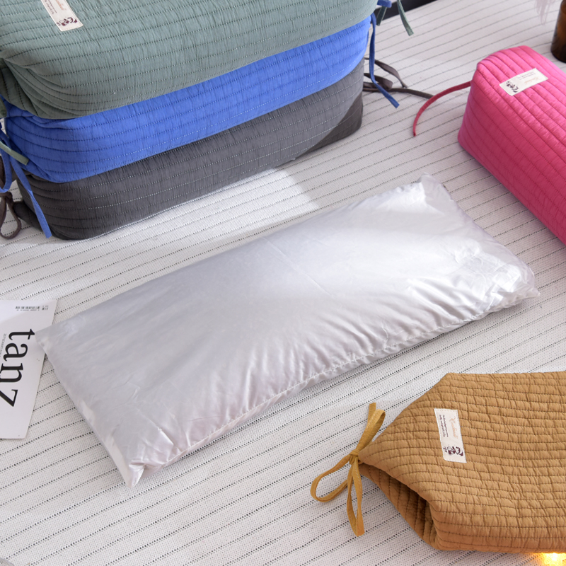 荞麦壳系绳糖果枕砂洗面料吸汗透气绗缝可拆洗枕套可调节高度圆枕