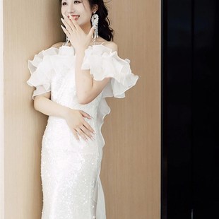 一字肩吊带晚礼服裙女高端白色气质年会主持人鱼尾性感长裙荷叶边