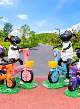 玻璃钢卡通奶牛骑车雕塑摆件户外园林景观动物幼儿园美陈装饰小品