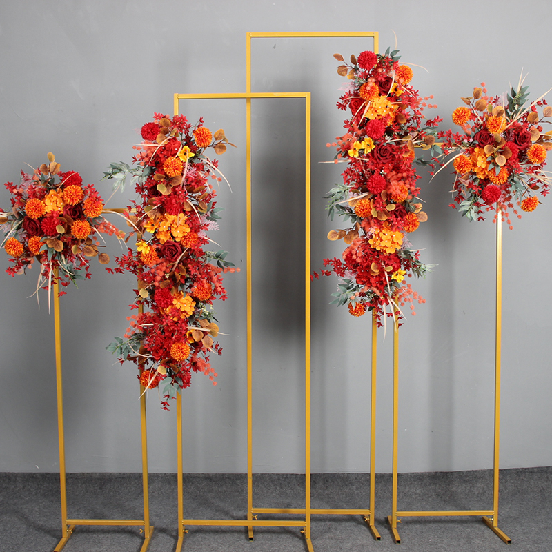 婚庆橘色系路引花 铁艺几何背景架子挂花 桔色花排红色背景墙花点