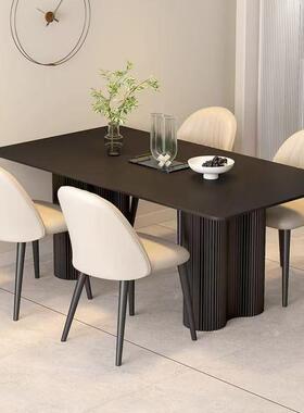 纯黑色岩板餐桌新款意式高端现代简约家用2024小户型长方形吃饭桌