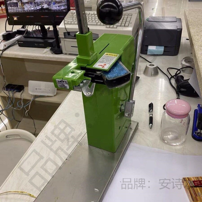 超市711塑料袋铝钉封口机