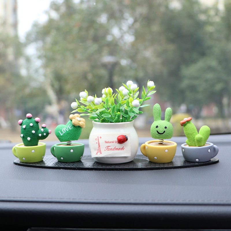 汽车中控台摆件车载摇头公仔植物气球创意男女可爱车内仪表台玩偶
