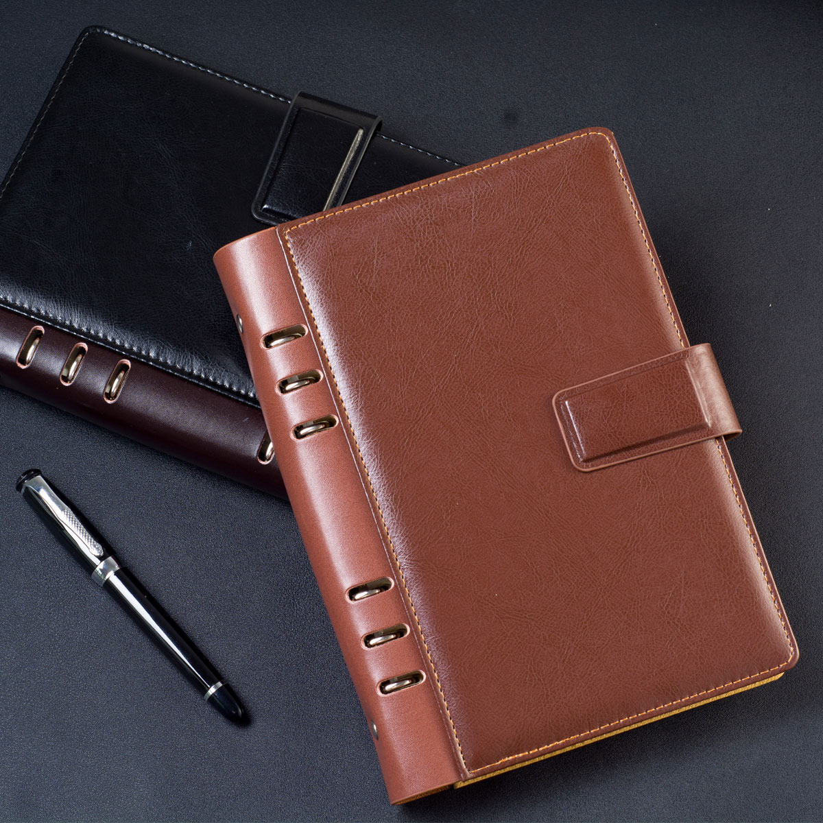 九千年文具定制商务办公镂空活页记事本定做  25K/A5高档仿牛皮拼