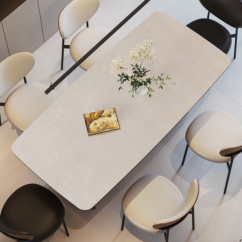 复古侘寂风杏色哑光岩板餐桌椅中古小户型简约现代长方形家用