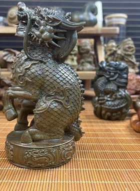 天然绿檀木香檀木祥瑞麒麟木雕手把件摆件转运文玩桌面家居工艺品