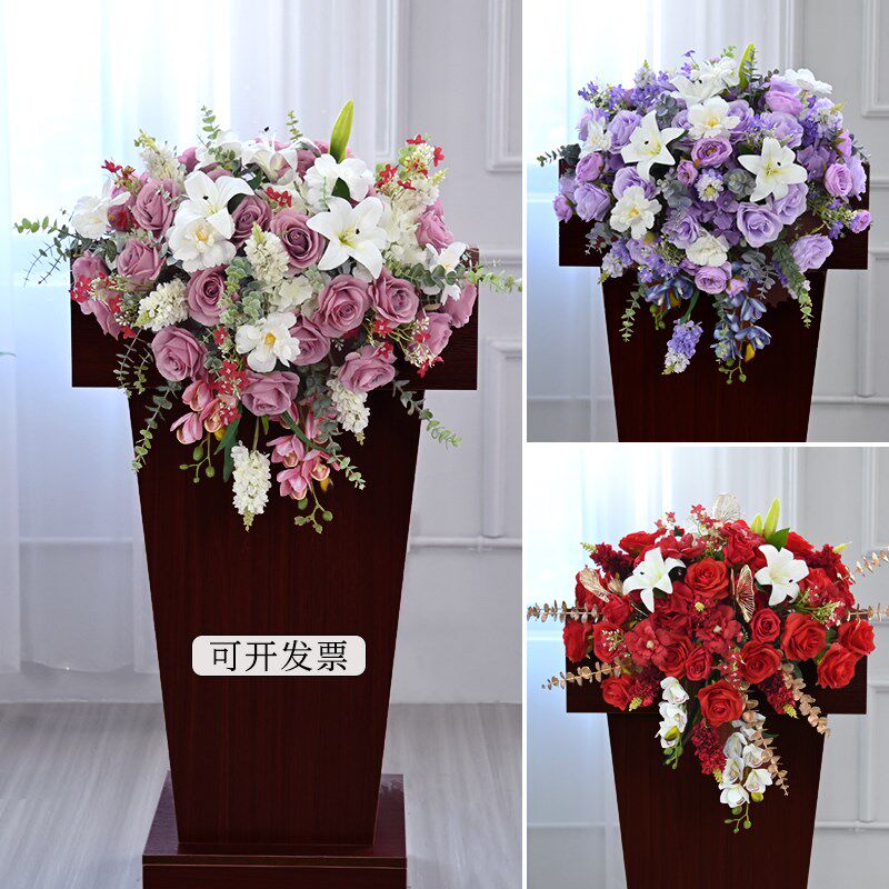 讲台花仿真花会议桌摆花酒店迎宾桌花演讲主席台花讲话发言台假花图片