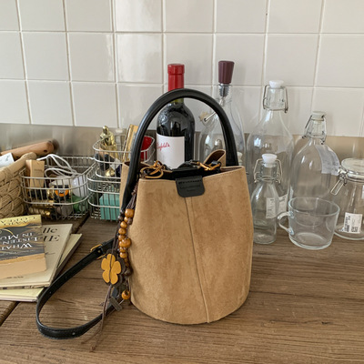 南风手提单肩斜挎包水桶包