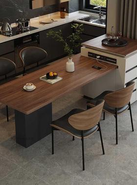 岛台可餐桌餐一体伸缩家大户型极简黑胡桃木GGM沃顿岩用板错位桌