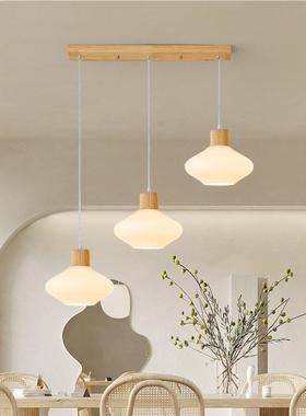 三头327直排风灯笼实餐吊灯现代简约原木奶油长条饭厅桌吧餐台木