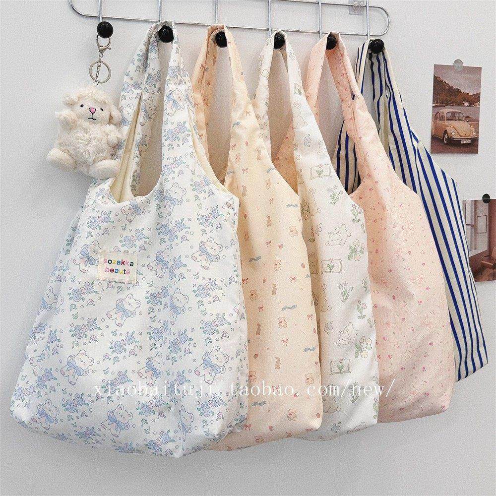 小众轻便休闲通勤帆布包包女大容量手提托特包购物袋