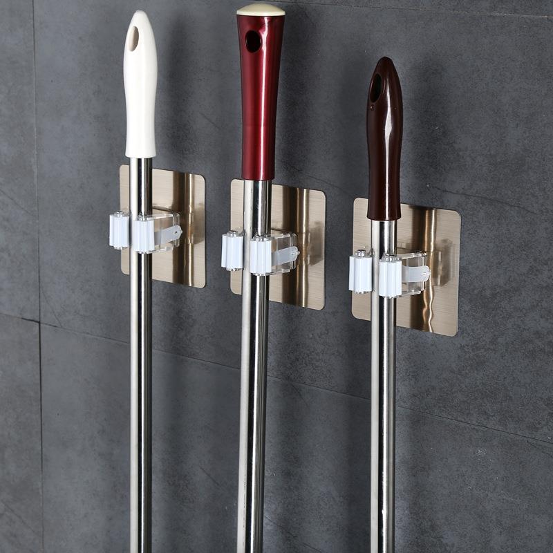 免打孔拖把壁挂夹卫生间挂架拖布扫把挂钩收纳架粘胶强力固定卡扣