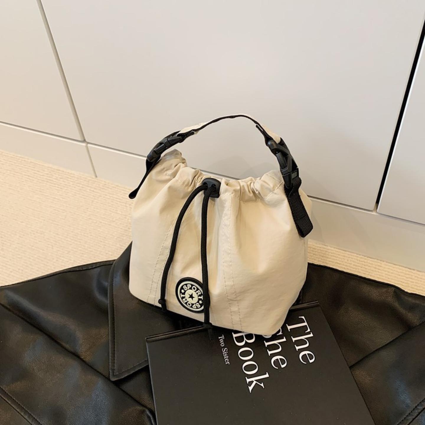 大容量轻便简约手提水桶包休闲